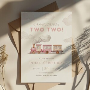 May include: A birthday invitation featuring a watercolour train illustration. The text reads "CHUGGA CHUGGA TWO TWO!" and "ALL ABOARD FOR EMMA'S 2ND BIRTHDAY" with date and RSVP details. The invitation is on a cream background.