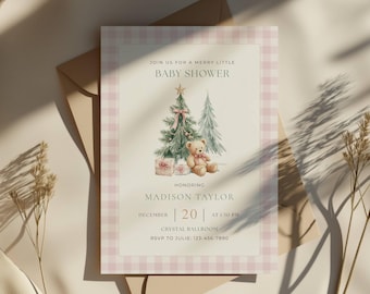 May include: A baby shower invitation with a Christmas theme. The card features a watercolor illustration of a Christmas tree, teddy bear, and gifts. The text reads "Join us for a Merry Little Baby Shower" and includes the honoree's name, date, time, and RSVP information.