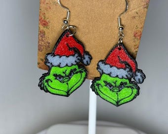 Pendientes colgantes del Grinch, joyería navideña con diseño de personaje, accesorio festivo con purpurina verde, diseño ligero, ideal para el invierno.