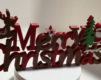 Decoración navideña impresa en 3D: Papá Noel y reno para estantería.