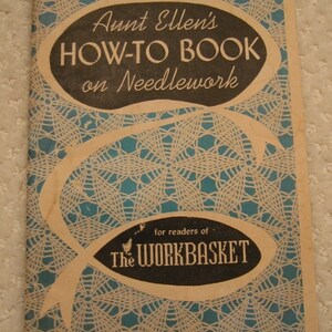 May include: Vintage "Aunt Ellen's HOW-TO BOOK on Needlework" with a teal and white patterned background. The cover features text in a black oval and a banner that reads "for readers of The WORKBASKET". The book has a cream-colored border.