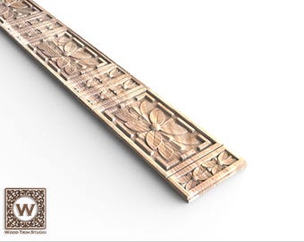 May include: A wooden trim moulding with a carved floral design. The trim is made of light brown wood and has a repeating pattern of flowers and leaves.
