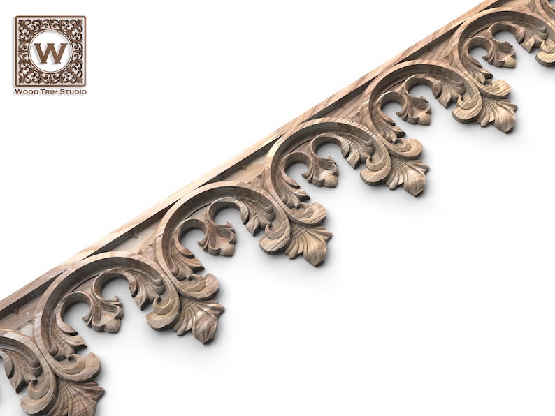 a decorative wooden trim with intricate floral designs.