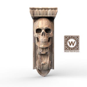 Peut inclure: Un corbeau en bois sculpté représentant un crâne détaillé. Le crâne est positionné au centre, avec des sculptures complexes autour. Le corbeau a un dessus décoratif et un fond arrondi. Le logo "Wood Trim Studio" est visible.
