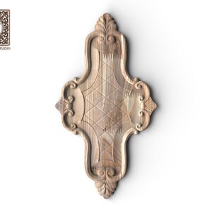 May include: A light brown wooden decorative applique featuring a symmetrical, elongated shape with intricate carved scrollwork at the top and bottom, and a central diamond-patterned grid texture. The wood grain is visible throughout the piece.
