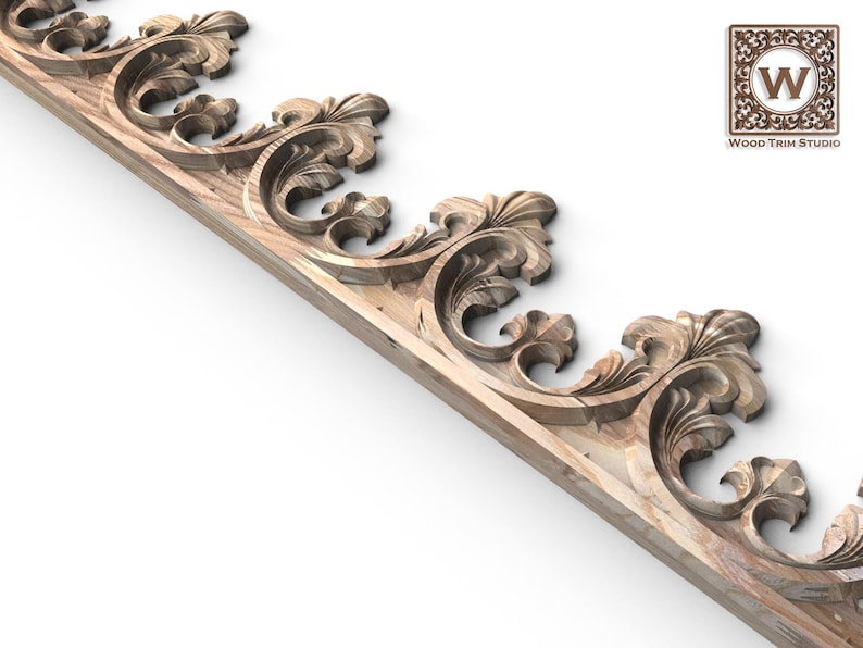 a decorative wooden panel with intricate scrollwork and floral designs.