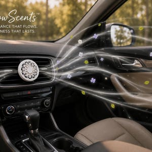 May include: A white circular car air freshener with a geometric lattice pattern clipped to a vehicle air vent. The text Flow Scents FRAGRANCE THAT FLOWS. FRESHNESS THAT LASTS. appears in the upper left corner with graphic swirls and flowers.