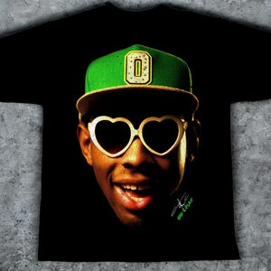Maglietta oversize con il volto di Tyler The Creator, 100% cotone - SPEDIZIONE GRATUITA - Massima qualità - Con scatola regalo e adesivi!