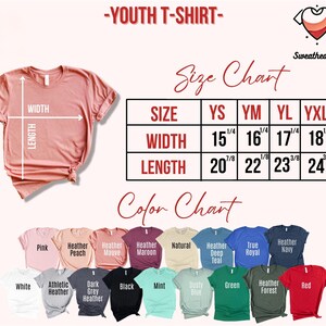May include: A pink youth t-shirt with a size chart showing width and length measurements in inches. The color chart displays various t-shirt colors, including white, black, and red. The text "-YOUTH T-SHIRT-" is at the top.