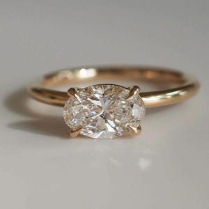 East to West Oval Cut 2.50 Carat D Color VVS1 Clarity IGI Certified Lab Grown Diamond Solitaire Engagement Ring 14k Gold Claw Prongs