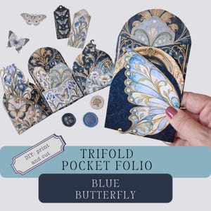 May include: A trifold pocket folio kit featuring blue butterfly and floral motifs. The set includes various paper pockets, tags, and circular wax seal embellishments in shades of navy, cream, and light blue. Text on the image reads: DIY: print and cut, TRIFOLD POCKET FOLIO, BLUE BUTTERFLY.