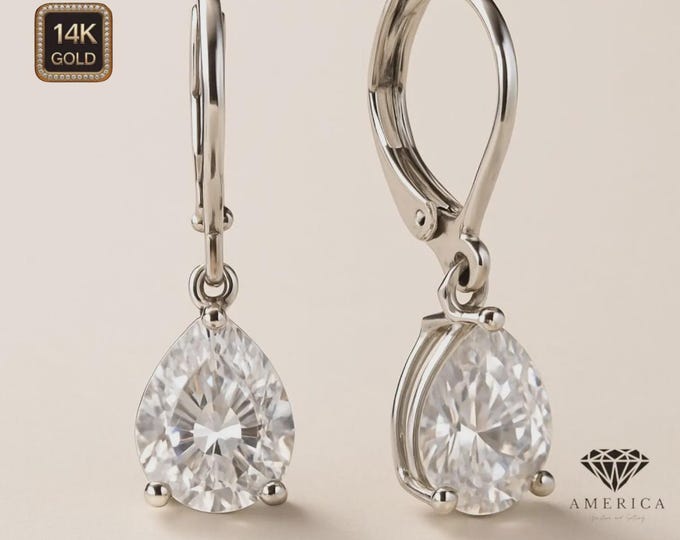 Moissanite Diamond  14K Solid Gold Lever Backing Earrings In Pear Shape Cut sold in 1 pair.
