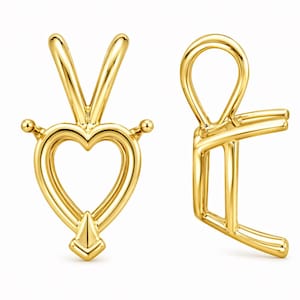 May include: Two gold-coloured pendant settings. One is heart-shaped with a pointed base and two small spheres on the sides. The other is a simple, open-backed setting with a loop at the top.