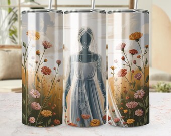 May include: A stainless steel tumbler featuring a watercolor design of a bride in a wedding dress and veil, surrounded by wildflowers in shades of orange, pink, and yellow. The background has a soft, blurred effect.