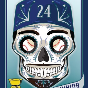 May include: A colorful Day of the Dead sugar skull illustration with a baseball cap on top. The skull is wearing a blue baseball cap with the number 24 on it. The eyes are baseballs with red stitching. The skull is smiling and has a gold trophy below it. The text "JUNIOR" is at the bottom of the image.