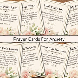 May include: A collection of prayer cards for anxiety, each featuring a different Bible verse and floral accents. The cards have a cream background with text in a classic font. The phrase "Prayer Cards For Anxiety" is displayed prominently.