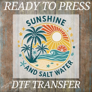 May include: A DTF transfer design with the words "READY TO PRESS" at the top and "DTF TRANSFER" at the bottom. The design features a circular graphic with palm trees, a sun, waves, and the words "SUNSHINE AND SALT WATER". The color palette includes teal, orange, yellow, and beige.