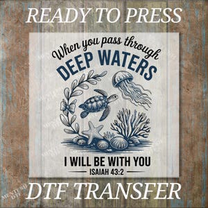 May include: Ready to press DTF transfer with an ocean theme. The design features a turtle, jellyfish, starfish, and coral. Text includes "When you pass through deep waters, I will be with you, Isaiah 43:2."