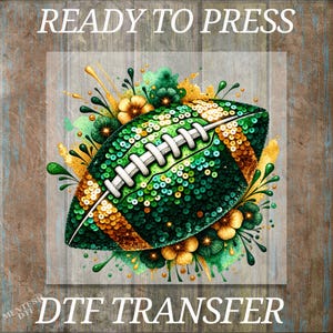 May include: A football graphic with a sequin texture in shades of green and gold, surrounded by stylized floral elements. The text READY TO PRESS is at the top and DTF TRANSFER is at the bottom. The design features a white lace pattern.