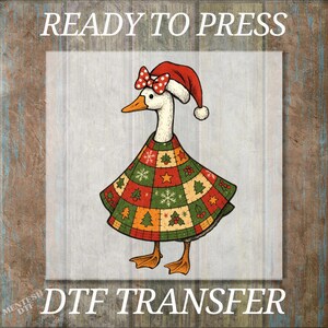 May include: A whimsical illustration of a goose wearing a Christmas dress and Santa hat with a red bow. The image includes the text "READY TO PRESS" at the top and "DTF TRANSFER" at the bottom, perfect for holiday crafts.