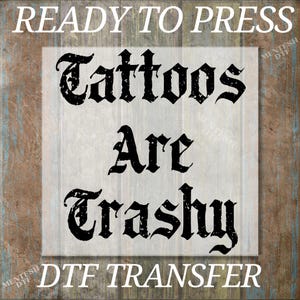 a sign that says, ready to press tattoos are grasy