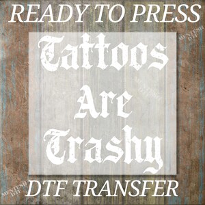 a picture of a sign that says, ready to press tattoos are grasy