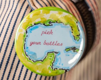 Pick Your Battles pinback button, gulf of Mexico, anti trump, anti maga