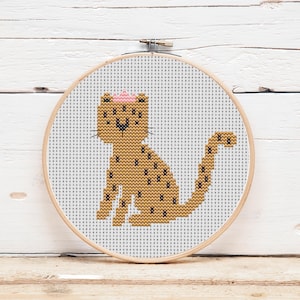 May include: A set of three ceramic mugs with a speckled, matte finish. The mugs are in shades of cream, light gray, and dark gray. Each mug has a simple, minimalist design, perfect for coffee or tea.