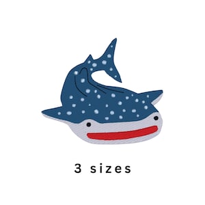 May include: A blue whale shark patch with white spots and a red mouth. The text "3 sizes" is below the whale shark.