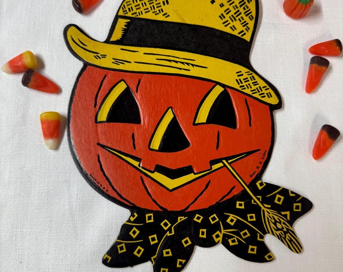 Vintage H. E. Luhrs Halloween Die Cut Pumpkin Face with a pipe Hanging Decoration, Made in USA
