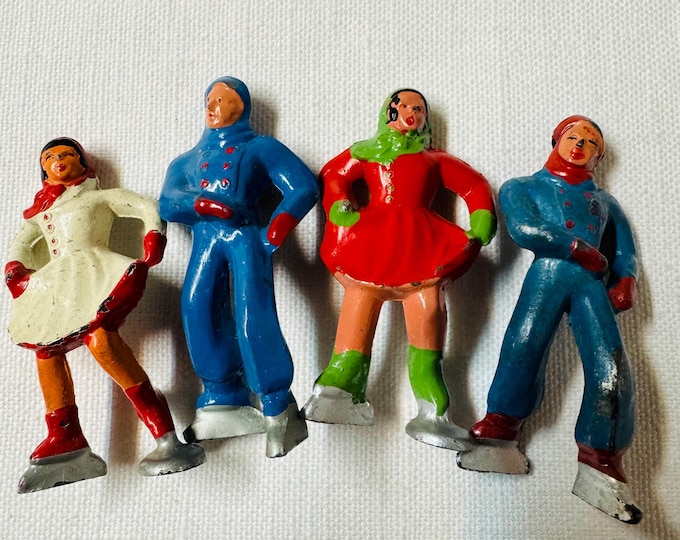 Four Vintage Barclay Cast Iron Skater Figures: 1940