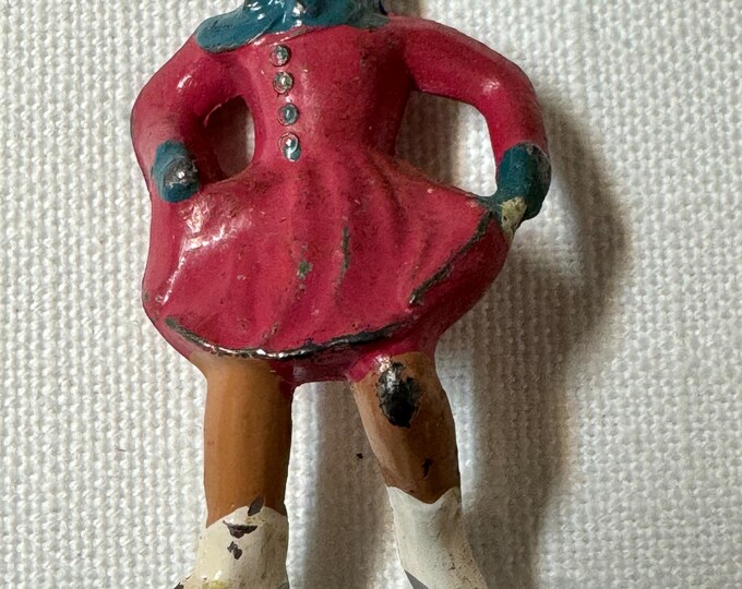 Rare Vintage Pink Barclay Cast Iron Skater Figures: 1940