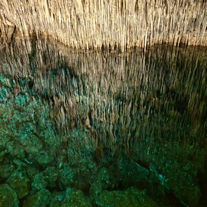 Abstract nature wall art — emerald cave lake and stalactites from the Dragon Caves, Mallorca. A surreal touch of Earth’s beauty