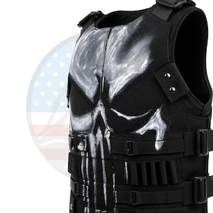 May include: Black tactical vest with a white skull design on the front. The vest features adjustable straps, multiple pouches, and a padded interior. The design is a stylized skull, with a glossy finish. The vest is made of durable, heavy-duty material.