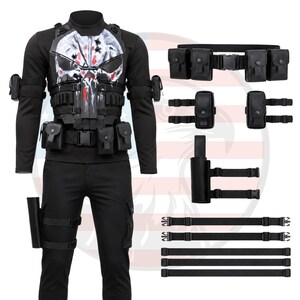 May include: Black tactical vest with a white skull design and red accents. The vest is paired with a black long-sleeve shirt, black pants, and various pouches and straps. A holster and additional straps are also included.