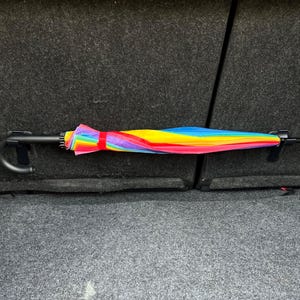 Portaparaguas ISOFIX para maletero de coche