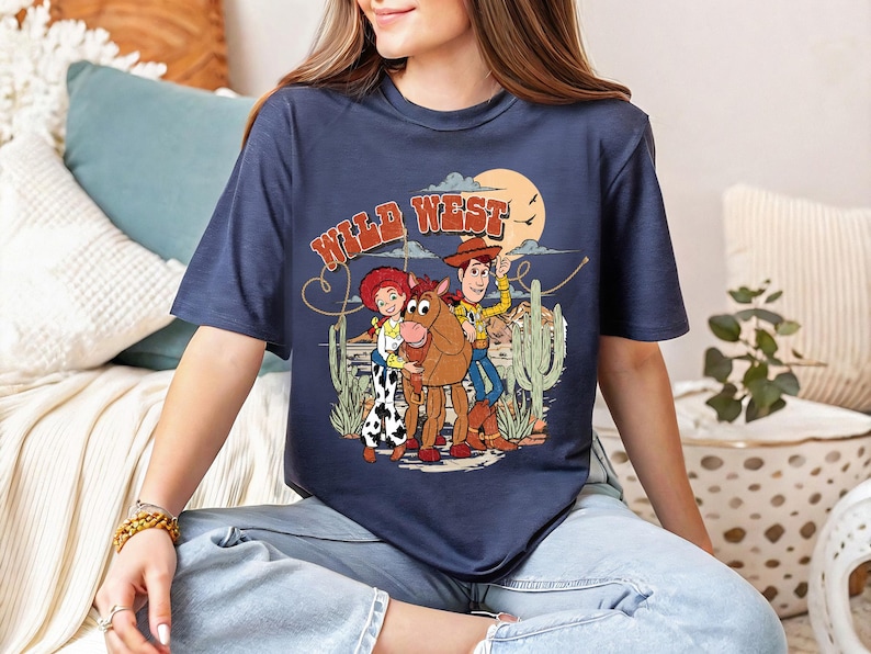 a woman sitting on a couch wearing a t - shirt