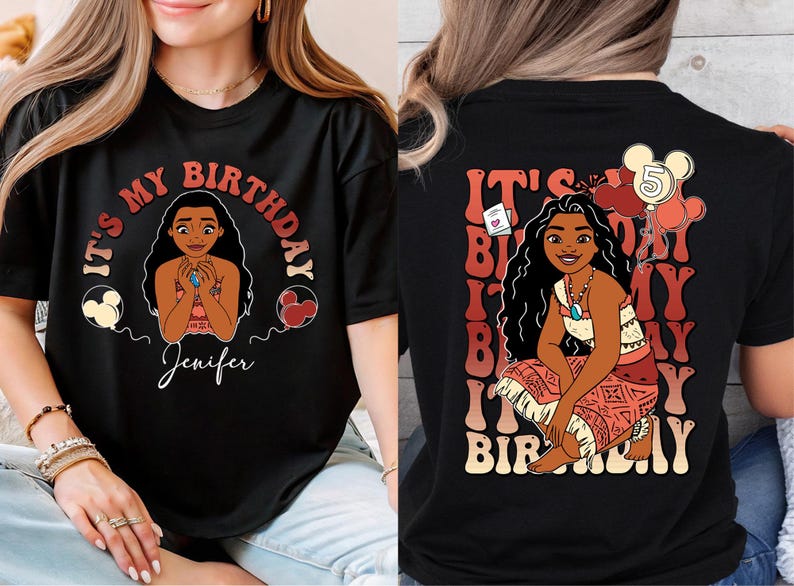 a woman wearing a black shirt with a picture of a woman on it