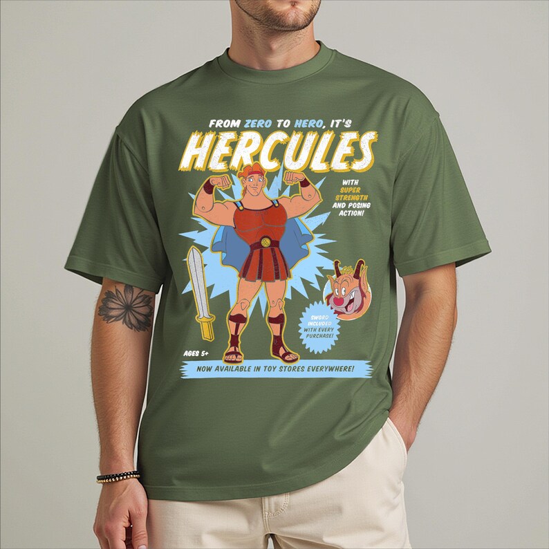 a man wearing a green shirt with a cartoon character on it