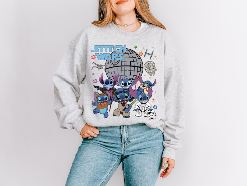 a woman wearing a sweatshirt with stitching on it