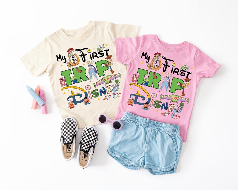 a couple of shirts and shorts on a white surface