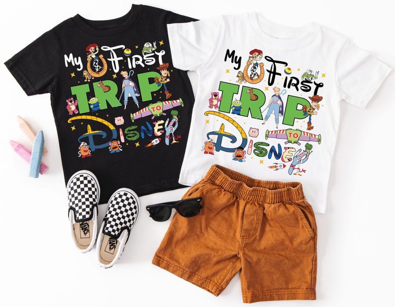 two children's clothing items are laid out on a white surface