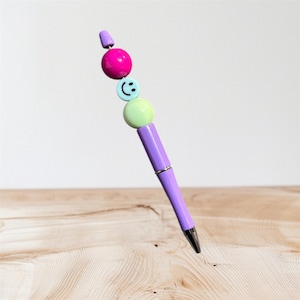 Smiley face pen