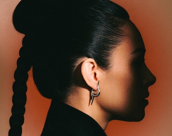 Platinum Plated Spike Hoop Earrings: Haute Couture Design