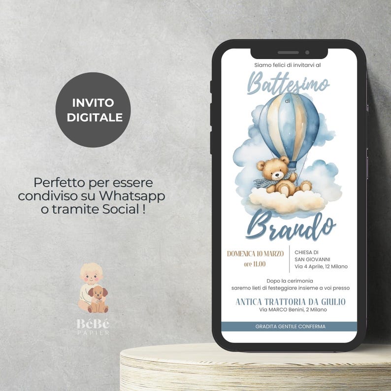 May include: A digital invitation for a baby boy's baptism. The invitation features a watercolor illustration of a teddy bear in a hot air balloon with the name "Brando" written in a decorative font. The invitation includes the date, time, and location of the baptism, as well as the location of the reception. The text "Siamo felici di invitarvi al Battesimo di" is written at the top of the invitation.