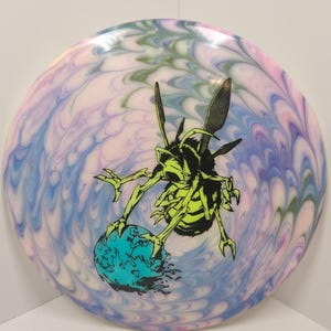 May include: A set of three ceramic mugs with a speckled, matte finish. The mugs are in shades of cream, light gray, and dark gray. Each mug has a simple, minimalist design, perfect for coffee or tea.