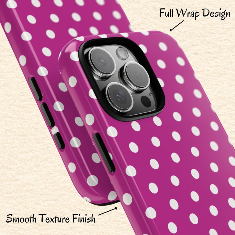 May include: A magenta phone case with a white polka dot pattern. The case has a black camera frame and the text "Full Wrap Design" and "Smooth Texture Finish".