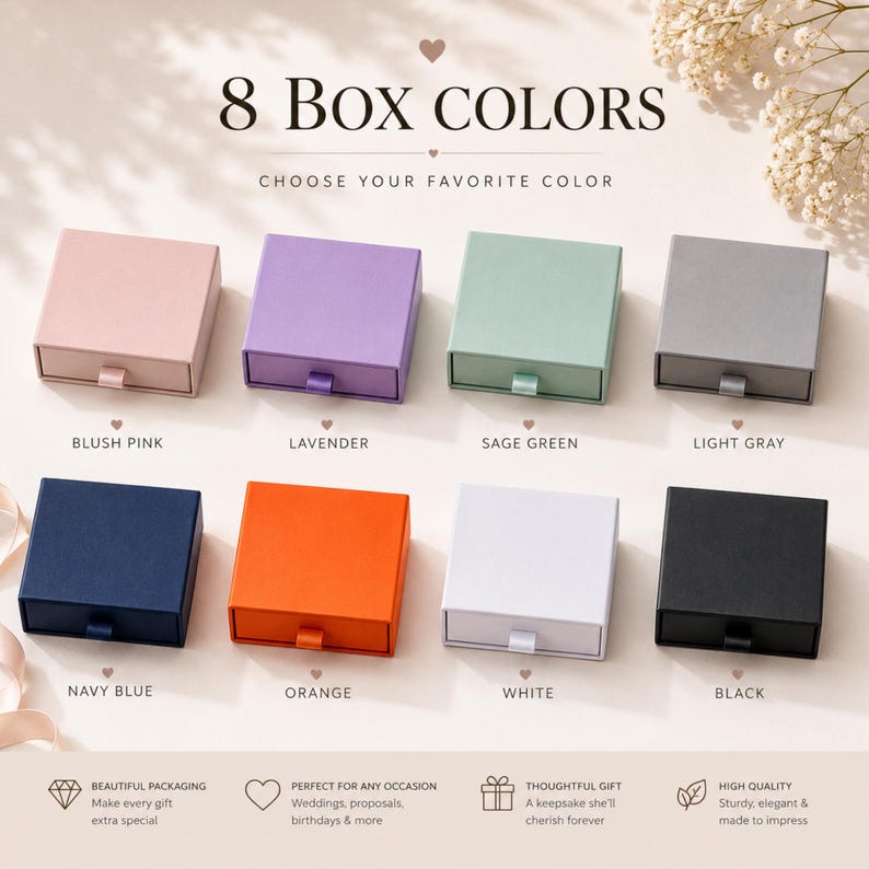 May include: Eight square sliding drawer boxes in blush pink, lavender, sage green, light gray, navy blue, orange, white, and black. The text 8 BOX COLORS CHOOSE YOUR FAVORITE COLOR is displayed above the boxes, with labels for each color below.