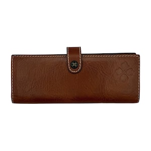 May include: A brown leather wallet with a snap closure. The wallet has white stitching around the edges and a floral design embossed on the front. The wallet is rectangular and appears to be made of high-quality leather.