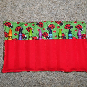 Lady bug green red crayon roll holds 8 to 14 crayons